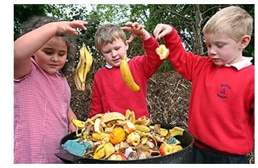 Recycling at school - children learning how to recycle waste